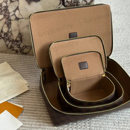 Closed storage box displaying monogram detail and secure closure