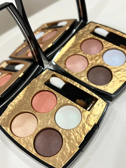 Eyeshadow palette with dual-ended applicator brush included
