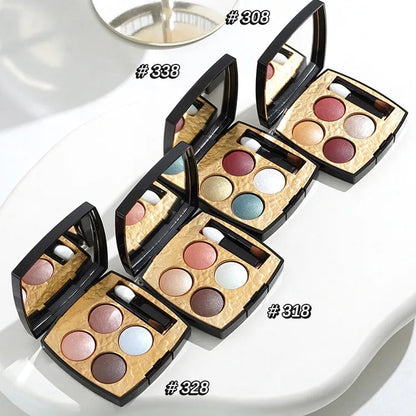 Four-color eyeshadow palette showing orange earth tone shades