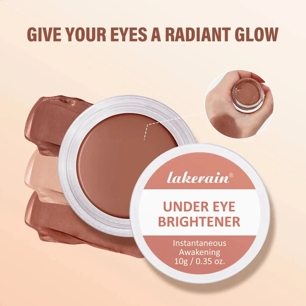 Color-correcting eye concealer in a small container with applicator