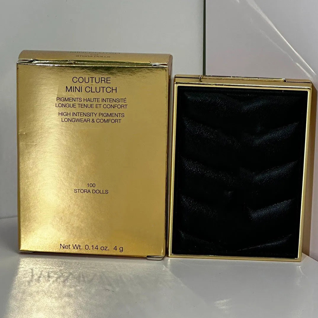 Open view of eyeshadow palette displaying four different color shades