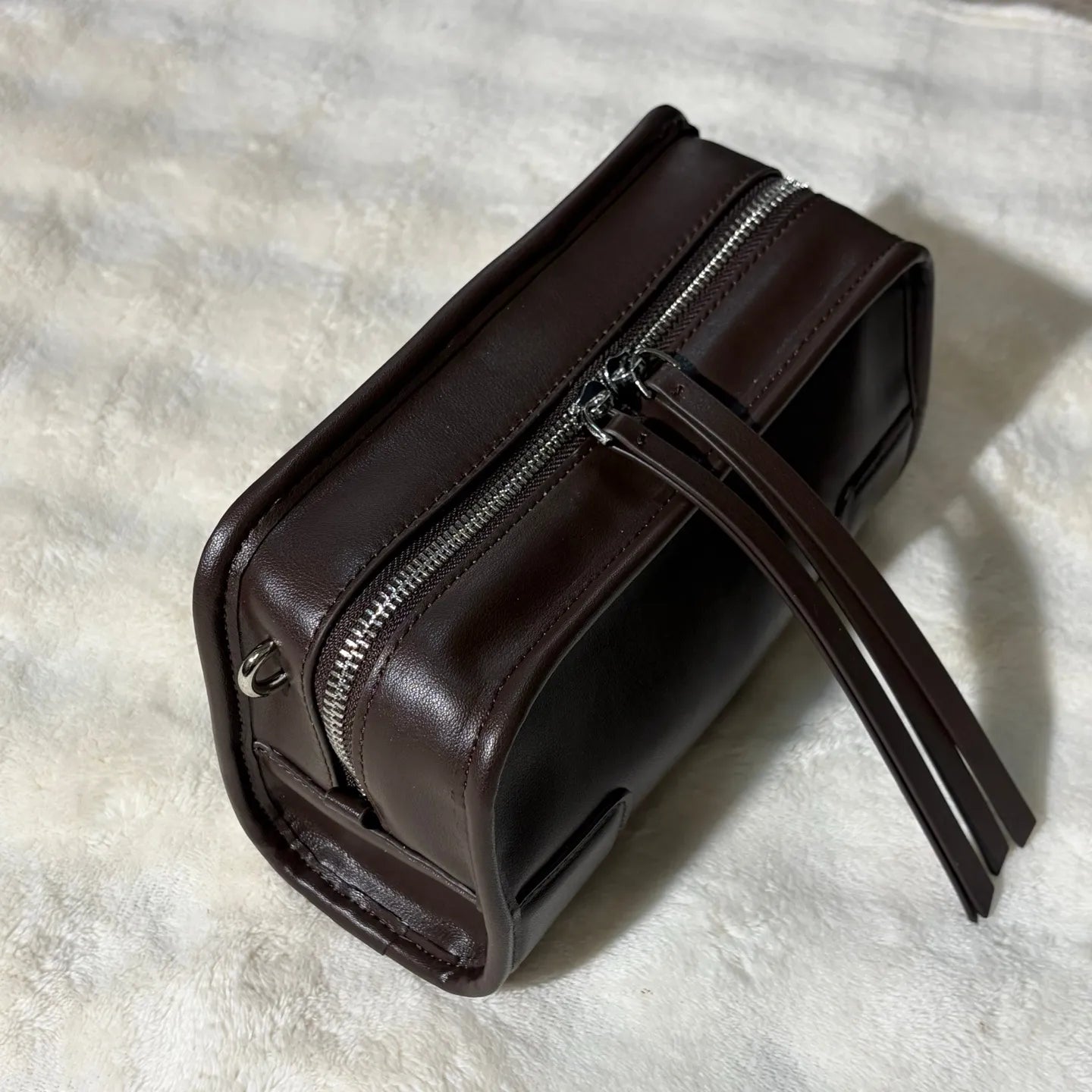 Close-up detail of the bag's material and stitching quality