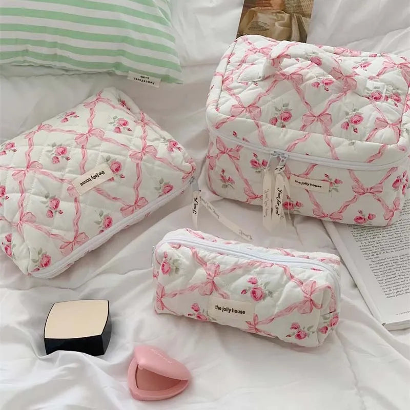 Open view showing interior space of large capacity makeup bag