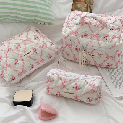 Open view showing interior space of large capacity makeup bag