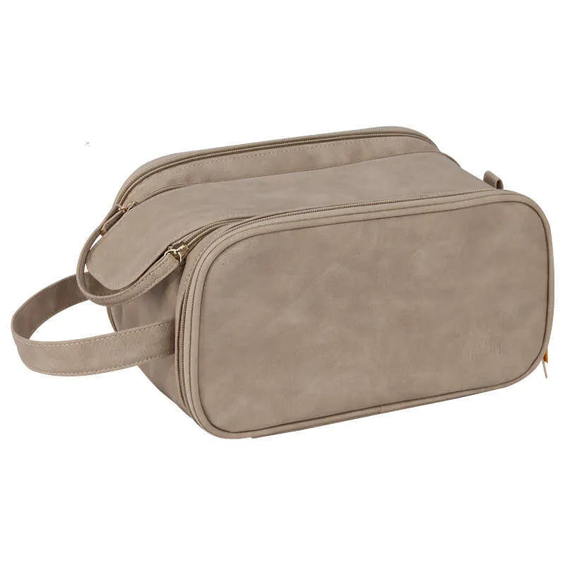 Multi-compartment makeup bag with open compartments showing interior organization