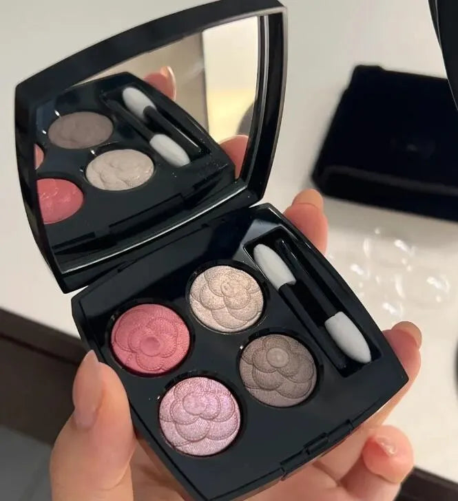 Four-shade eyeshadow palette showing matte and shimmer finishes