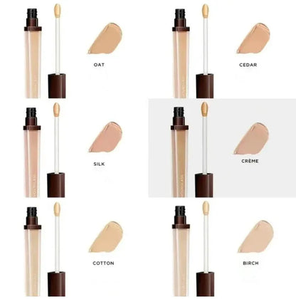 Eight different shades of cream concealer in small containers