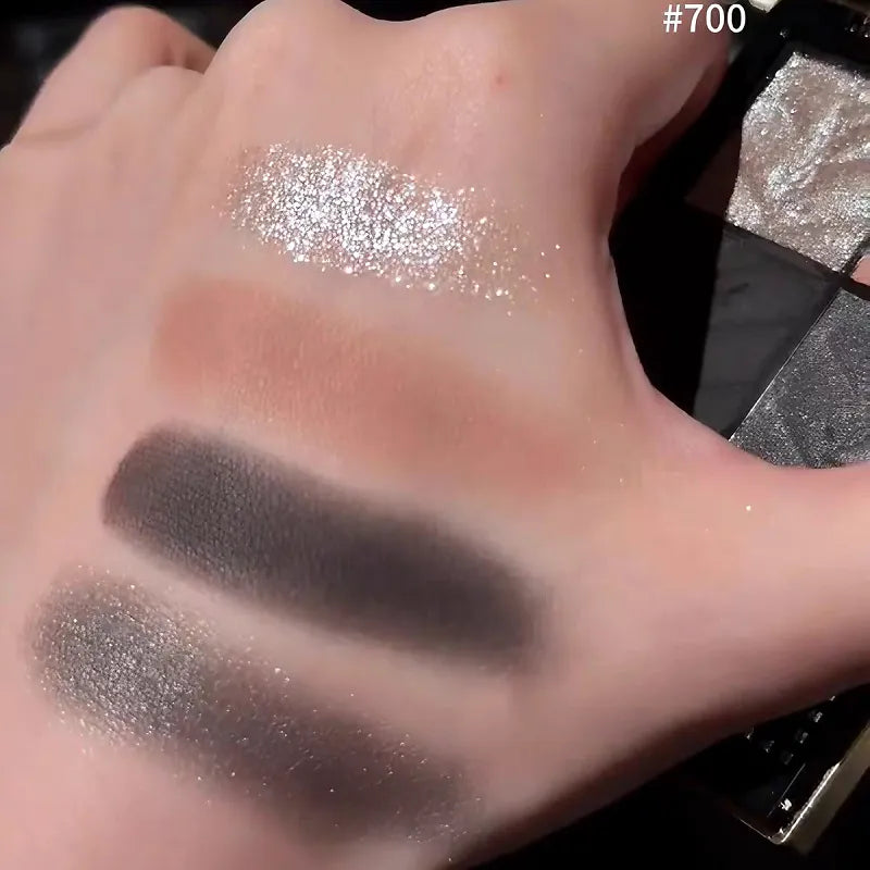 Swatch demonstration of the four complementary eyeshadow colors on skin