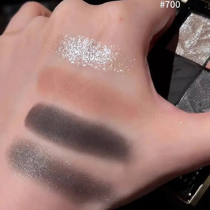 Swatch demonstration of the four complementary eyeshadow colors on skin
