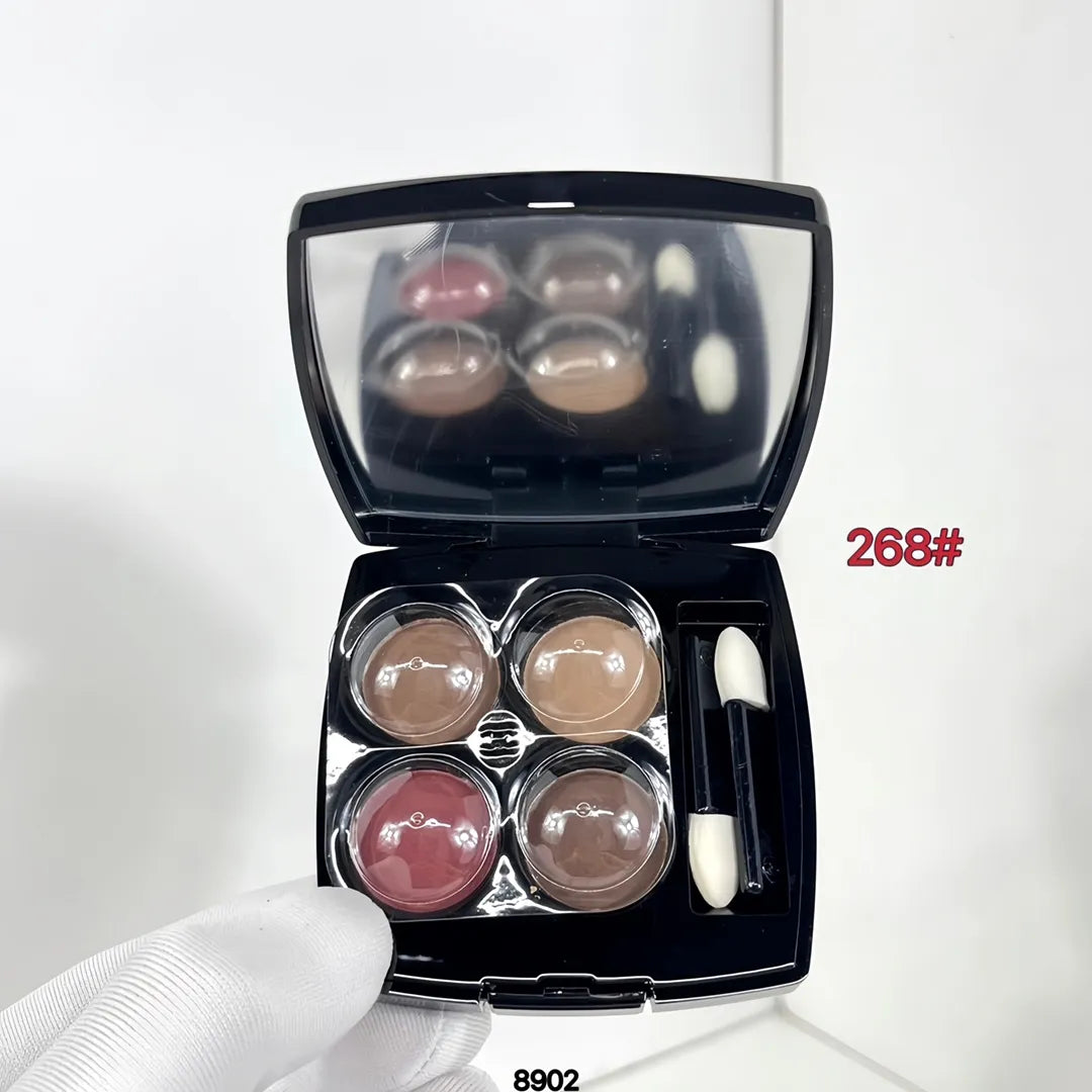 Dual-ended eyeshadow brushes included with the palette for application