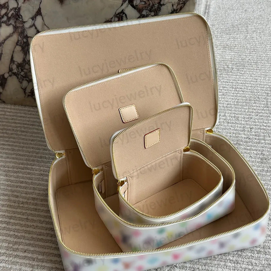 Leather jewelry storage box with floral design and multiple compartments