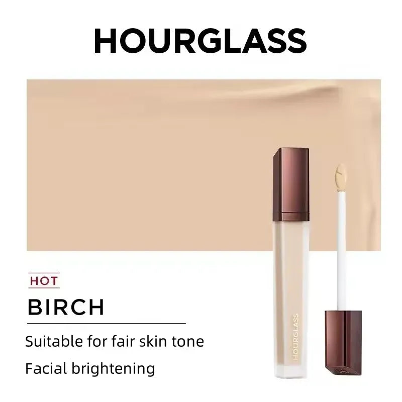 Concealer being applied to under-eye area with blending brush