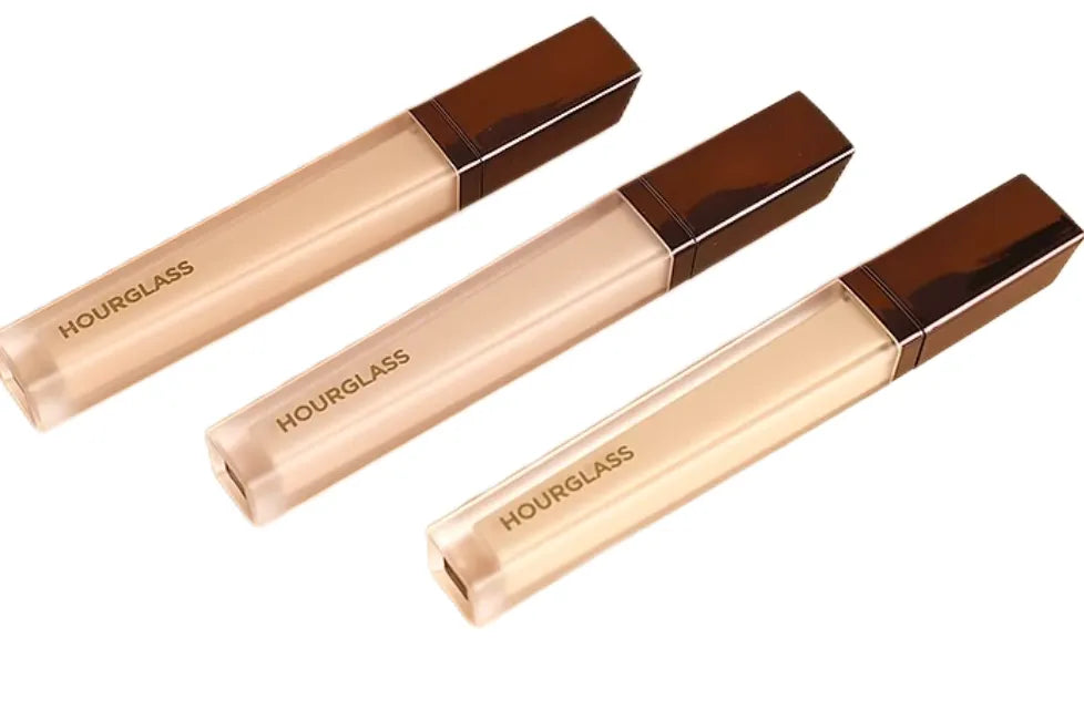 Close-up view of concealer stick showing smooth texture and applicator tip
