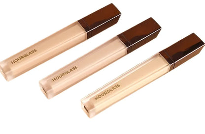 Close-up view of concealer stick showing smooth texture and applicator tip