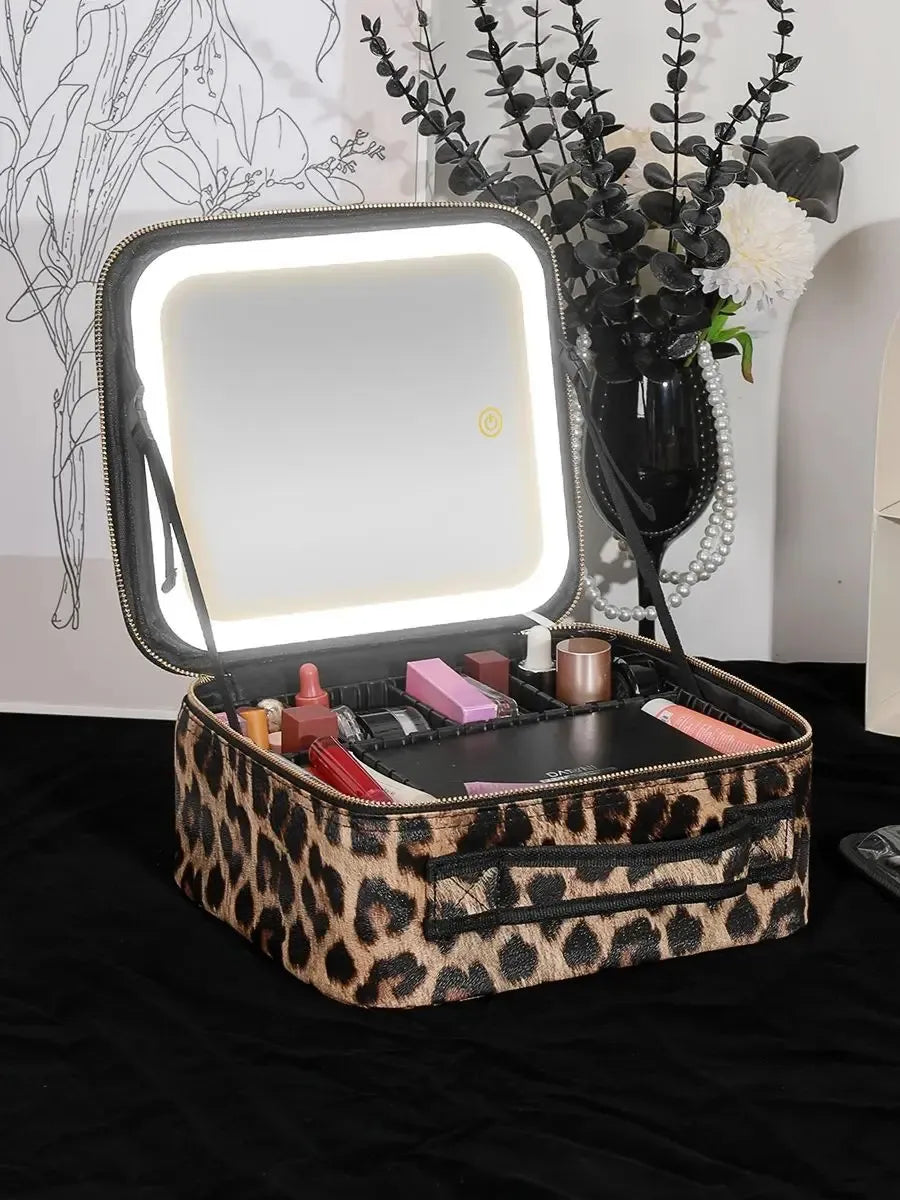 Leopard print makeup bag with open compartments showing interior organization