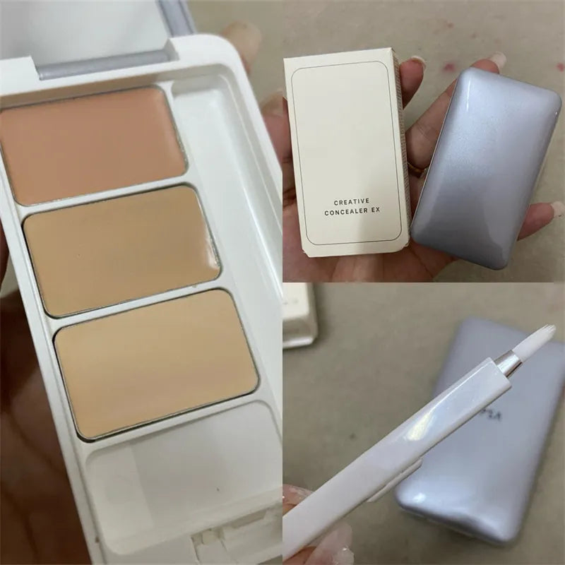 Compact with three shades of cream concealer and a small brush