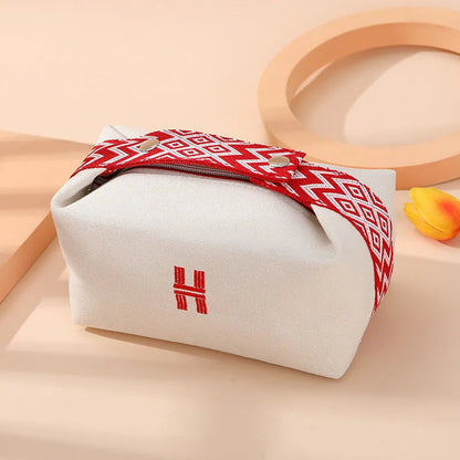 Interior view of cosmetics bag showing spacious compartment for toiletries