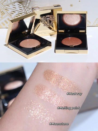 Three-color eyeshadow palette showing matte and metallic shades