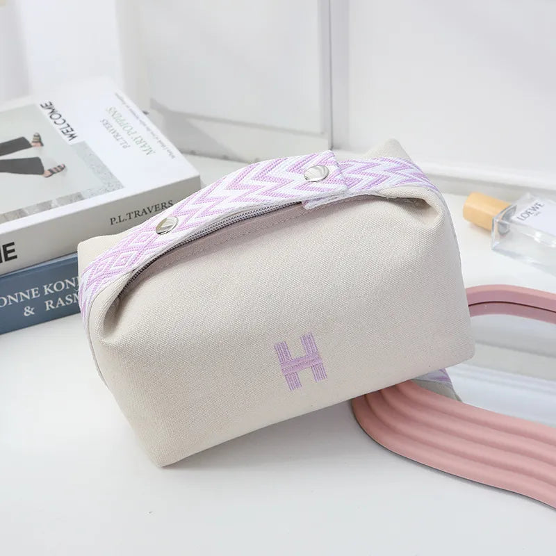 Cosmetics bag in black color with secure zipper closure