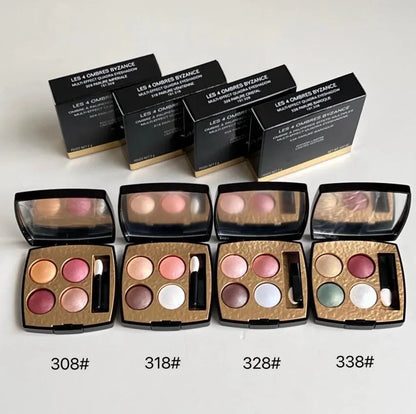 Close-up view of eyeshadow palette with four complementary shades