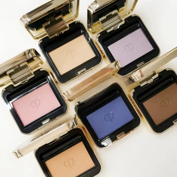 Close-up view of matte and pearlescent powder textures in the palette