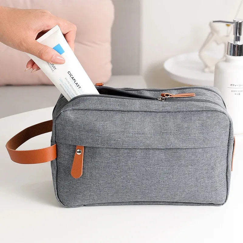 Interior view of the toiletry bag showing multiple compartments for organization