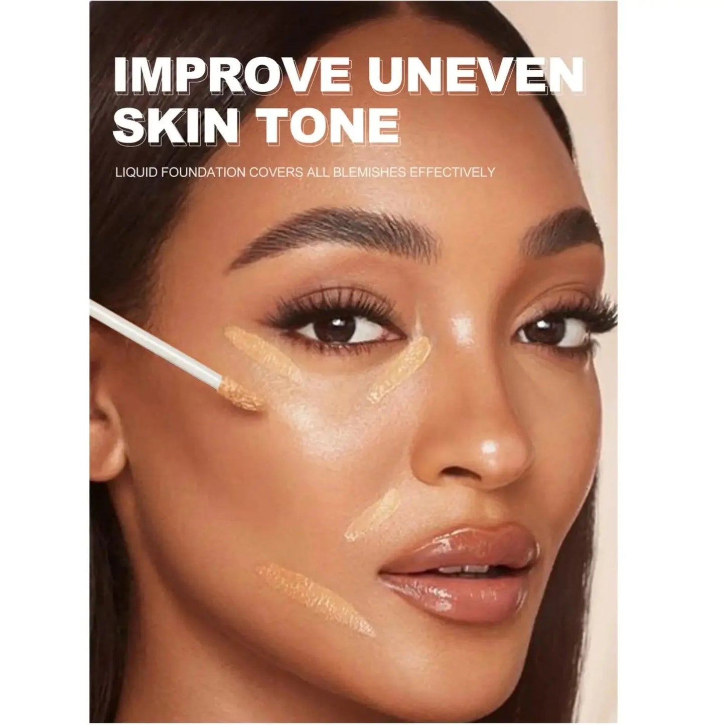 Close-up of concealer being applied to under-eye area