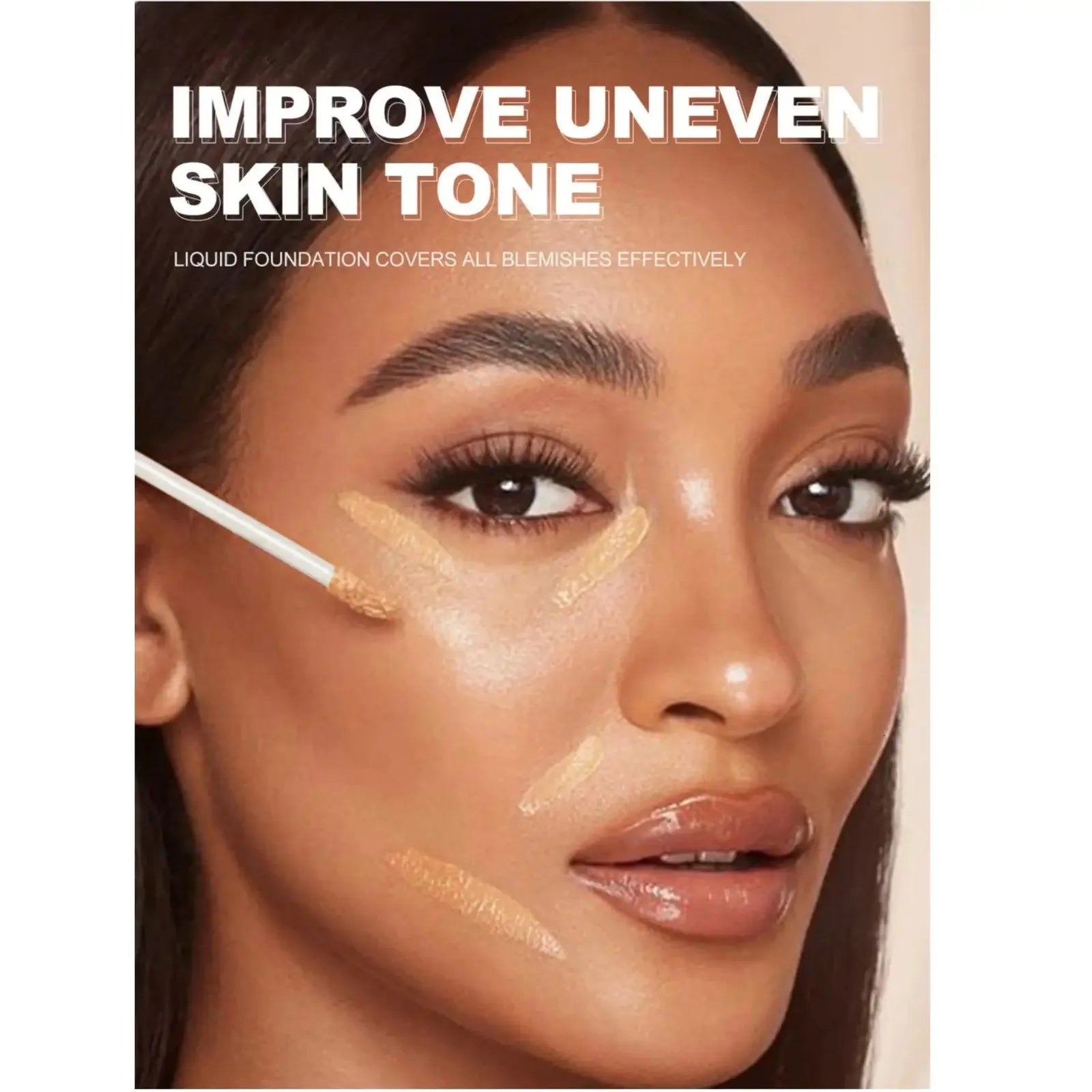 Close-up of concealer being applied to under-eye area