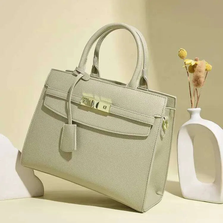 Front view of leather women's shoulder bag showing vintage design