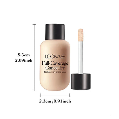 Person applying concealer to under eye area with fingertip