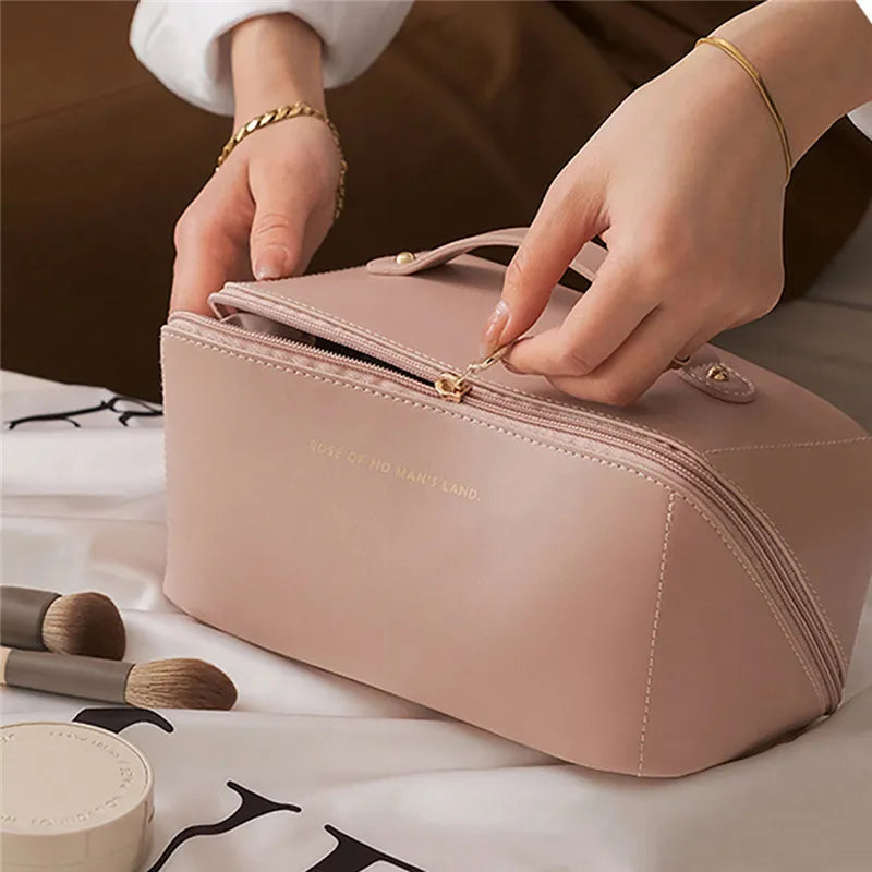 Open view of cosmetic bag showing interior compartments and organization features