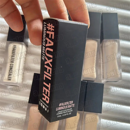 Liquid concealer product in clear container with applicator