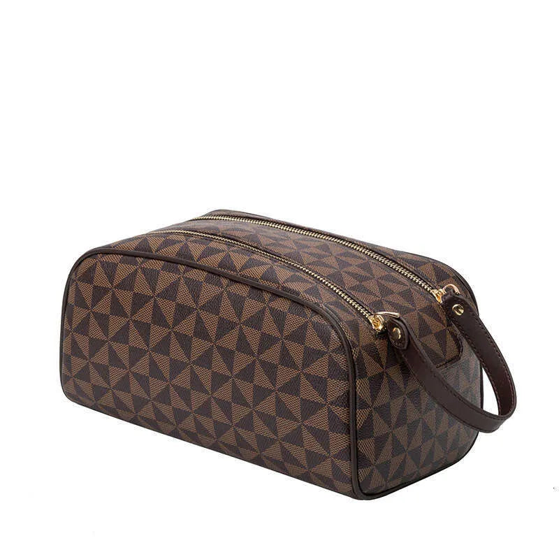 Interior view of cosmetic bag showing large capacity and organized compartments