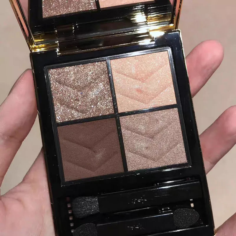 Four eyeshadow shades displayed in a rectangular compact palette