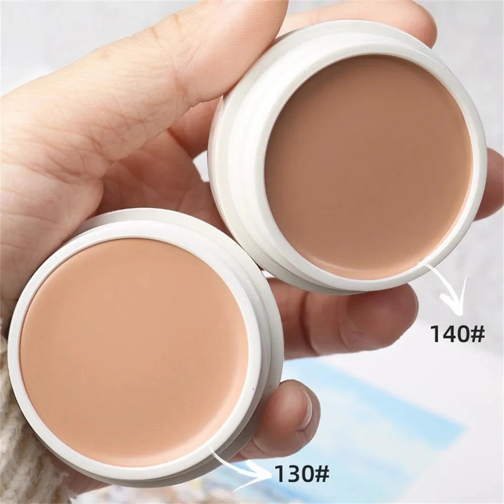 Swatches of concealer shades on skin showing color range