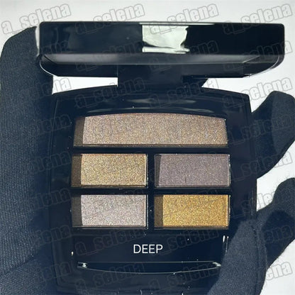 Close-up view of the eyeshadow palette showing texture and color details