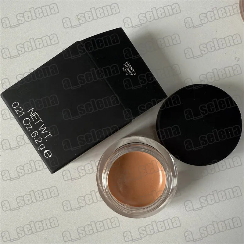 Close-up view of makeup product applied to hand demonstrating coverage