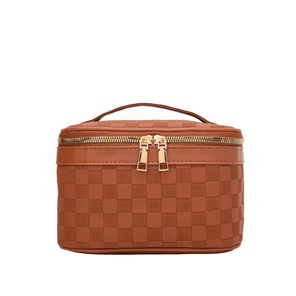 Checkered pattern cosmetic bag with zipper closure