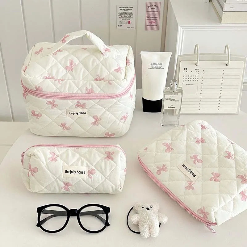 Front view of bow cotton makeup bag showing decorative bow detail