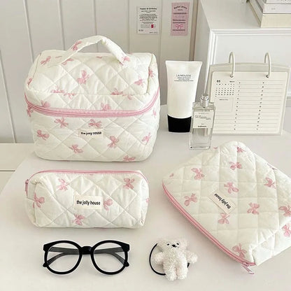 Front view of bow cotton makeup bag showing decorative bow detail