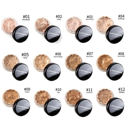 Product shown next to makeup brush on neutral background
