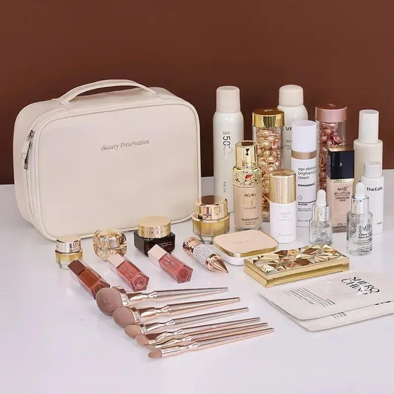 Compact cosmetic tote shown in a neutral color with organized interior compartments