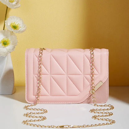 Front view of embossed small square shoulder bag with chain strap