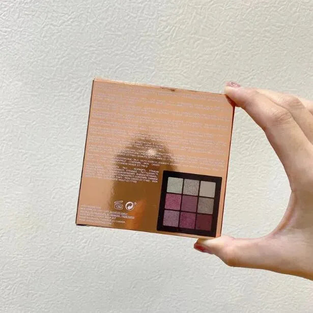 Close-up of eyeshadow palette showing texture and color details