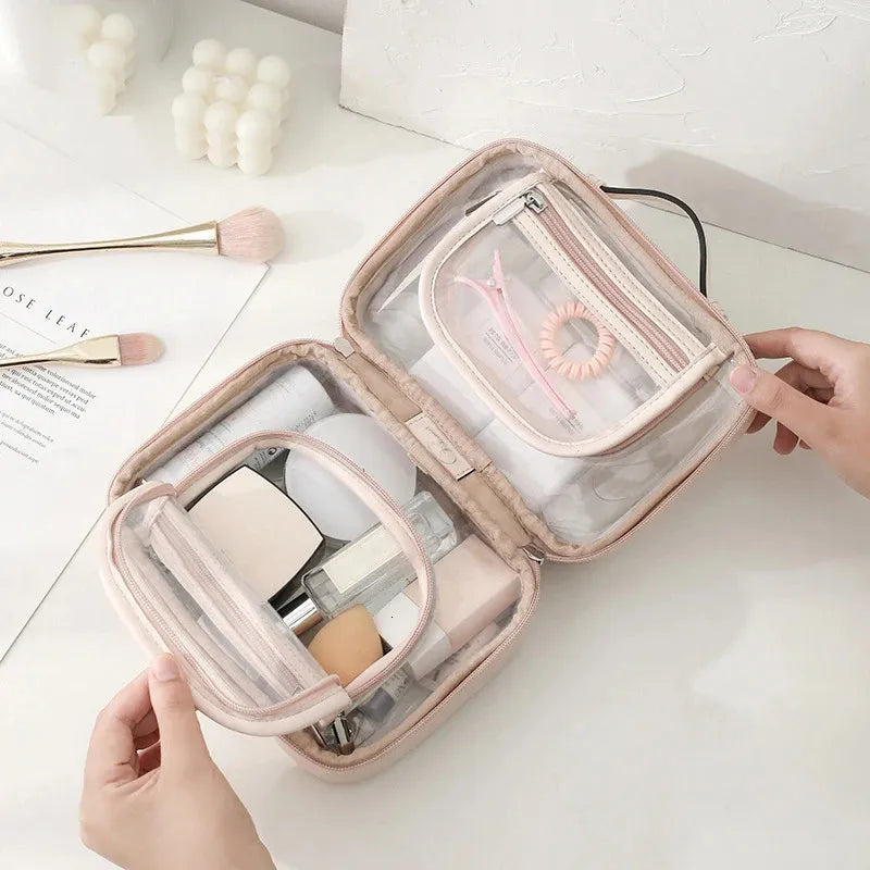 Transparent double-layer makeup bag showing interior compartments for organization