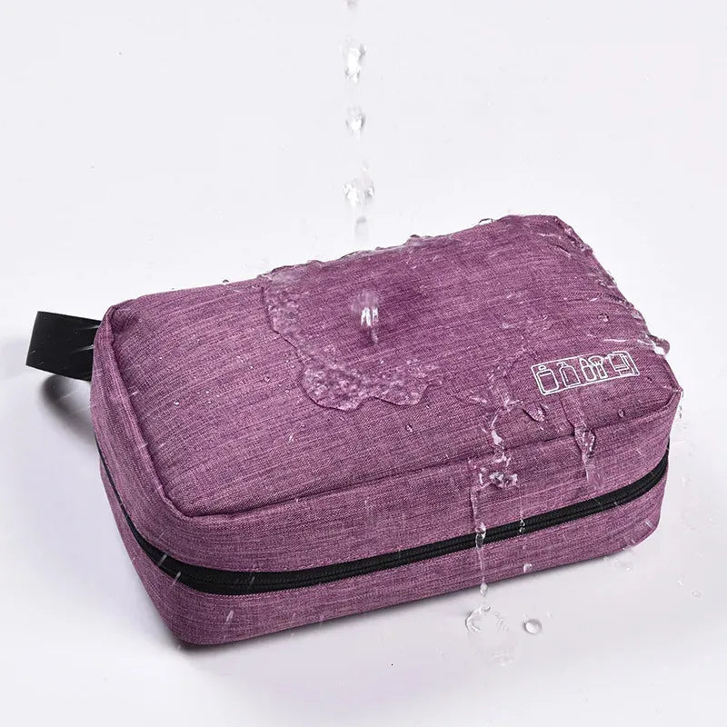 Travel cosmetic organizer with pendant handle displayed in multiple color options