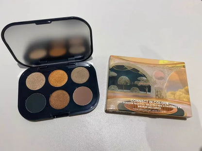 Professional eye shadow palette with embedded color lenses open view