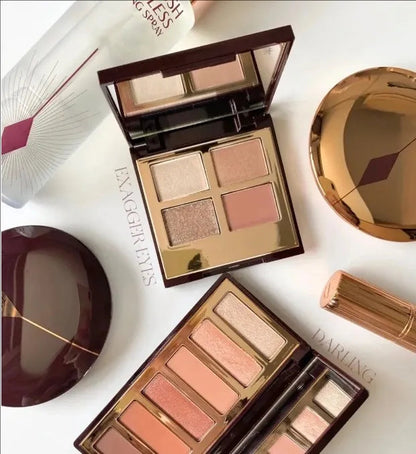 Compact eyeshadow palette with six color pans in matte and shimmer finishes