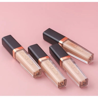 Close-up of concealer being blended on face