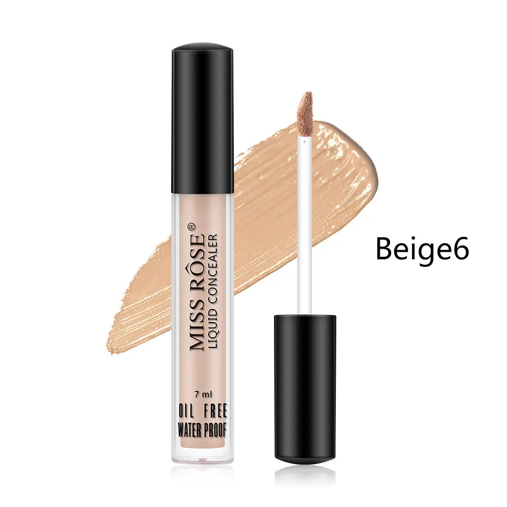 Close-up view of a concealer stick with creamy formula visible on tip